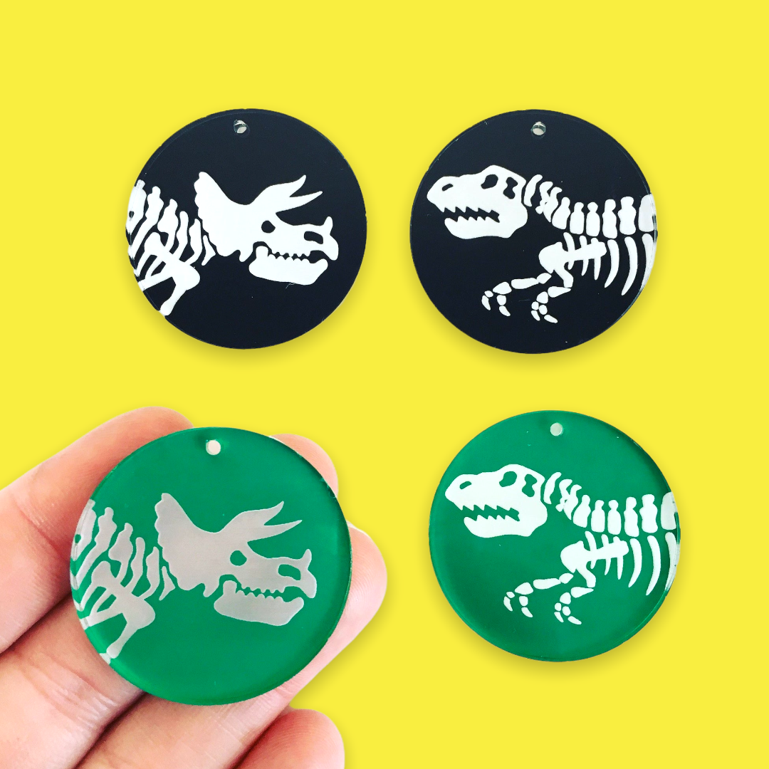 Crafty Cuts Laser Deluxe_ etched Deluxe: Jurassic Battle Charms - 2 pairs
